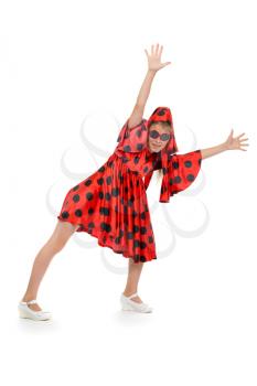 teen girl dancing in a red polka-dot dress with sunglasses. Isolate on white background