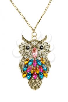 Owl necklace adorned with precious stones on a chain. Isolate on white.
