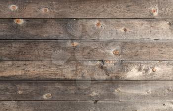 There is a lot of space for copy on this photograph of an old wood background.