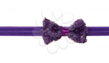 Dark-violet ribbon bow isolated on white background