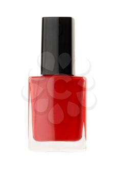 Bottle of red nail polish isolated on a white background.