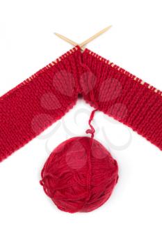 Lifes knitting needles tangle of red thread. Handmade crafts. Isolate on white.