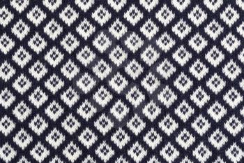 Knitting pattern, pattern square. Woolen cloth.