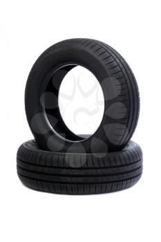 Two rubber car tire side view. Studio. Isolate on white.