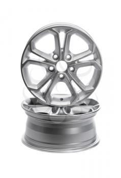 Two steel alloy car rims on a white background.