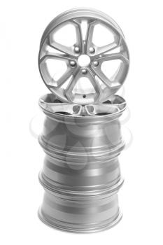 Four steel alloy car rims on a white background.