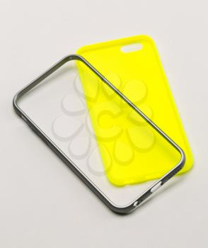 Yellow Case for phone and gray bumper.