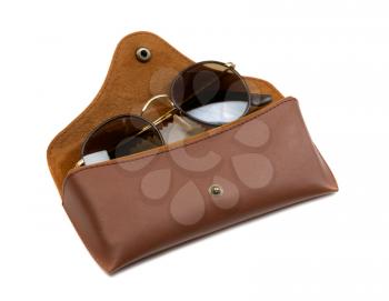 Sunglasses in brown leather case. Isolate on white.