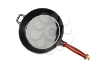 A wok with a wooden handle on a white background. Wok.