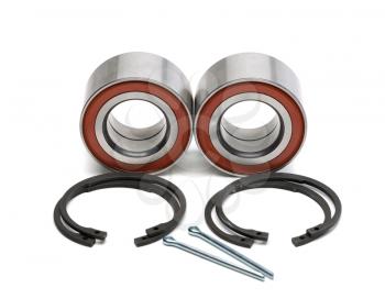 Set of two wheel bearings and four locking rings in the two cotter pin. Isolate on white.