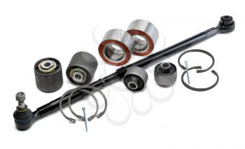 Set of automotive parts, thrust bearings, retaining rings, hobs and pins isolated on white background.