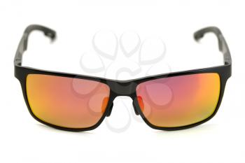 Sunglasses with red and yellow glass. Isolate on white.