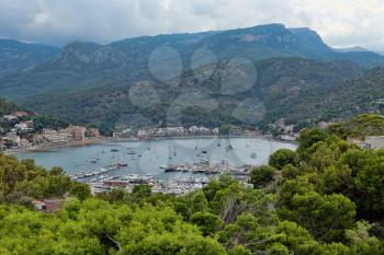 Port with yachts in the bay in the mountain