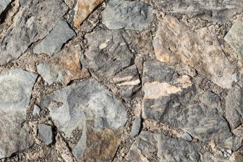 Paving stones. Background from the rock.
