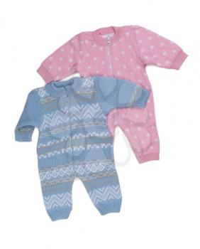 Two knitted pink and blue rompers. Isolate on white.