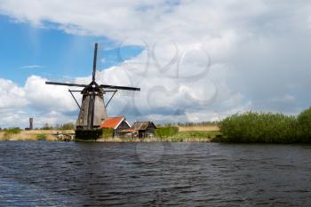 Kinderdijk windmill on a canal in the Netherlands.