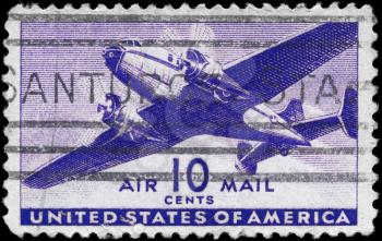Royalty Free Photo of a 1941 US Stamp of a Twin-Motored Transport Plane