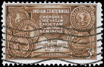 Royalty Free Photo of 1948 US Stamp Shows the Map of Indian Territory and Seals of Five Tribes, Centennial