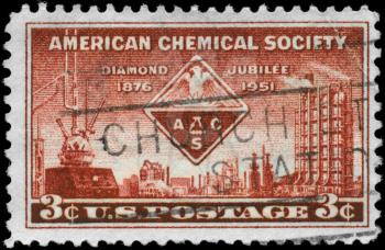 Royalty Free Photo of 1951 US Stamp Shows the American Chemical Society Emblem and Symbols of Chemistry, AMC Issue