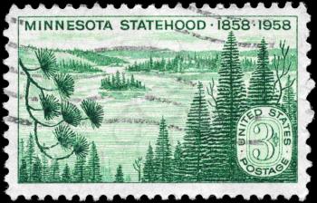 Royalty Free Photo of 1958 US Stamp Shows Lakes and Pines, Minnesota Statehood Centenary