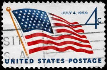 Royalty Free Photo of 1959 US Stamp Shows the US Flag, With the Inscription July 4, 1959