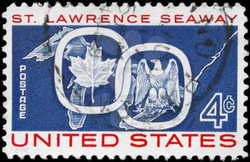 Royalty Free Photo of 1959 US Stamp Shows the Great Lakes, Maple Leaf and Eagle Emblems, Opening of the St. Lawrence Seaway