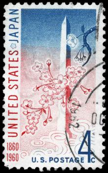 Royalty Free Photo of 1960 US Stamp Shows the Washington Monument and Cherry Blossoms, US - Japan Treaty