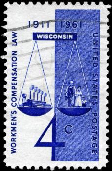 Royalty Free Photo of 1961 US Stamp Devoted to 50th Anniversary of the 1st Successful Workmens Compensation Law