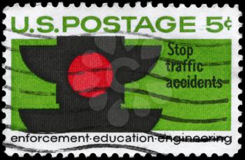 Royalty Free Photo of 1965 US Stamp Shows a Traffic Signal, for Traffic Safety and Accident Prevention