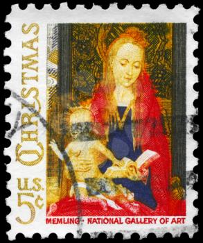 Royalty Free Photo of 1966 US Stamp Shows a Fragment of Madonna and Child with Angels, by the Flemish Artist Hans Memling (1430-1494), National Gallery of Art, Washington