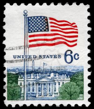 Royalty Free Photo of 1967 US Stamp hows the Flag and White House