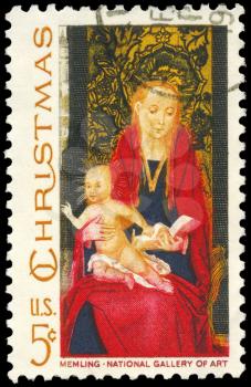 Royalty Free Photo of 1967 US Stamp Shows a Fragment of Madonna and Child with Angels  by the Flemish Artist Hans Memling (1430-1494), National Gallery of Art, Washington