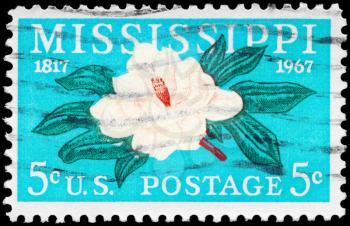 Royalty Free Photo of 1967 US Stamp Shows the Magnolia, Mississippi Statehood, 150th Anniversary