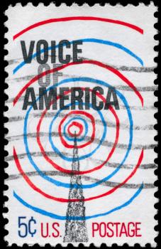 Royalty Free Photo of 1967 US Stamp Shows the Radio Transmission Tower and Waves, Voice of America Issue