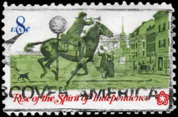 Royalty Free Photo of 1973 US Stamp Shows the Post Rider, Rise of the Spirit of Independence