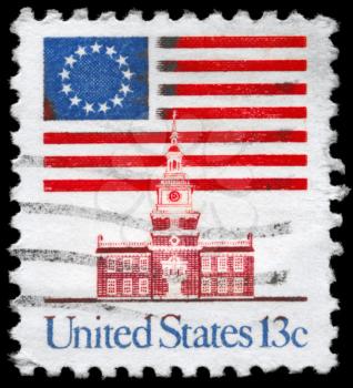 Royalty Free Photo of 1975 US Stamp Shows the 13-Star Flag, Independence Hall