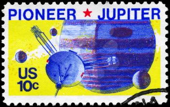 Royalty Free Photo of 1975 US Stamp Shows the Pioneer 10 Passing Jupiter, Space