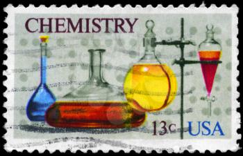Royalty Free Photo of 1976 US Stamp Shows the Flasks, Separatory Funnel, Computer Tape, Chemistry Issue