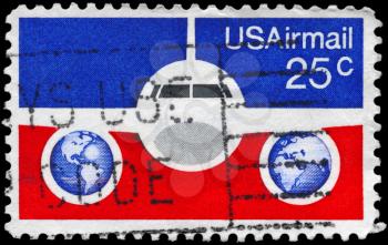 Royalty Free Photo of 1976 US Stamp Shows the Plane and Globes