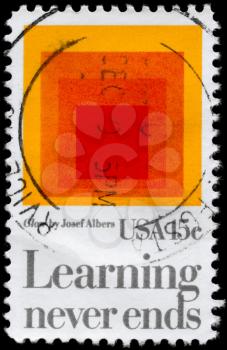 Royalty Free Photo of 1980 US Stamp Shows the Homage to the Square: Glow by Josef Albers, Devoted to American Education