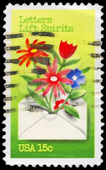 Royalty Free Photo of 1980 US Stamp Shows the Letters Lift Spirits, Letter Writing