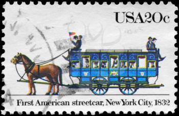 Royalty Free Photo of 1983 US Stamp Shows the First American Streetcar, New York City, 1832