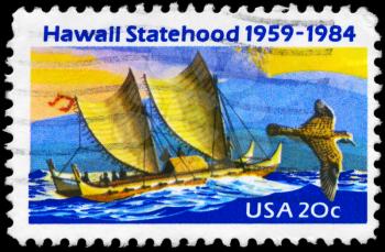 Royalty Free Photo of 1984 US Stamp Shows the Eastern Polynesian Canoe, Golden Plover, Mauna Loa Volcano, 25th Anniversary of Hawaii Statehood