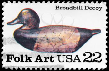 Royalty Free Photo of 1985 US Stamp Shows the Broadbill Decoy, American Folk Art