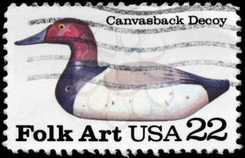 Royalty Free Photo of 1985 US Stamp Shows the Canvasback Decoy, American Folk Art Duck Decoys