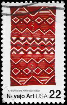 Royalty Free Photo of 1986 US Stamp Shows the Navajo Art, Blankets in the Museum of the American Indian, Folk Art