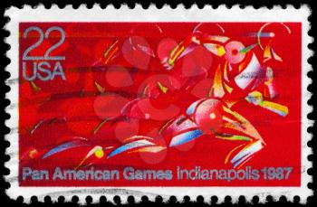 Royalty Free Photo of 1987 US Stamp Shows a Runner in Full Stride, Pan American Games, Indianapolis