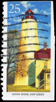 Royalty Free Photo of 1990 US Stamp Shows Sandy Hook Lighthouse, New Jersey, Lighthouses