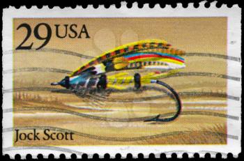 Royalty Free Photo of 1991 US Stamp Shows the Jock Scott Fly, Fishing Flies