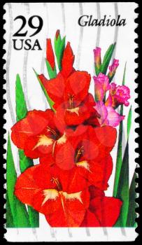 Royalty Free Photo of 1994 US Stamp Shows the Gladiola, Garden Flowers